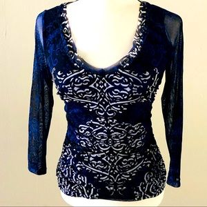 INC stretchy, top w sheer long sleeves, design
